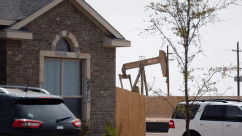 A pumpjack operates in the middle of a neighborhood in Midland, Texas. (Kevin Clancy / Newsy)